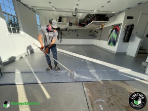 Residential Garage Epoxy Flooring and Cabinet Storage Solution in Stephen City, Virginia