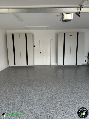 Residential Garage Epoxy Flooring and Cabinet Storage Solution in Holly Springs, Nc