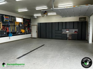 Residential Garage Epoxy Flooring and Cabinet Storage Solution in Minnetonka, Mn