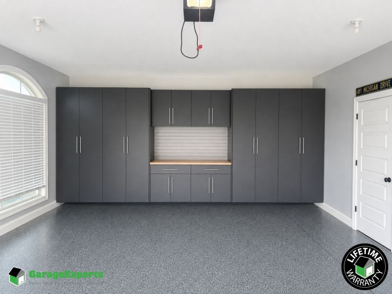 Residential Garage Epoxy Flooring and Cabinet Storage Solution in Madison, Al