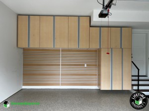 Residential Garage Epoxy Flooring and Cabinet Storage Solution in Seattle, Washington