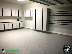 Residential New Construction Garage Epoxy Flooring and Cabinet Storage Solution in Madisonville, La