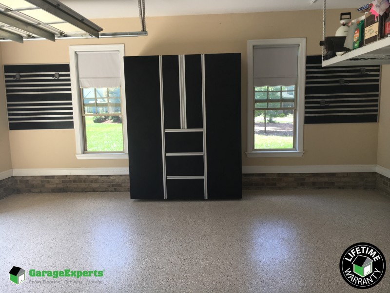 Residential Garage Epoxy Flooring and Cabinet Storage Solution in Waxhaw, Nc