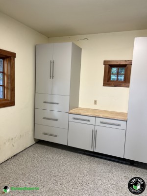 Residential Garage Epoxy Flooring and Cabinet Storage Solution in Leander, Tx