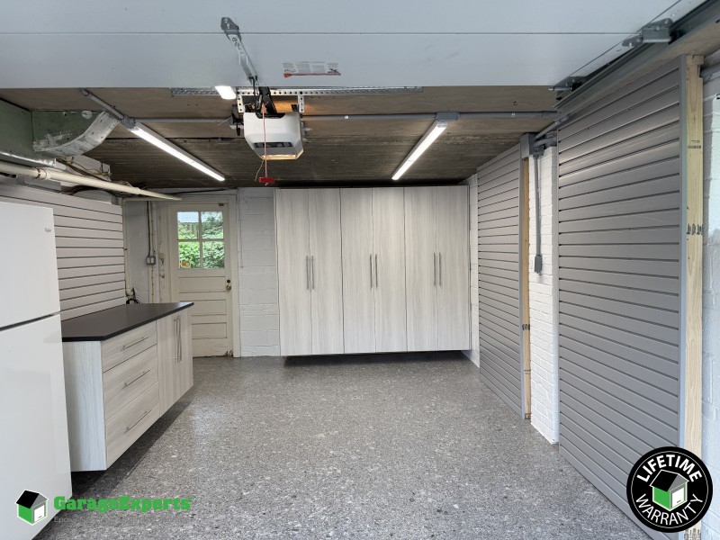 Residential Converting A Garage Into A Functional Storage Space Epoxy Flooring and Cabinet Storage Solution in Bethesda,