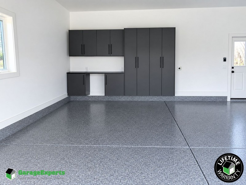 Residential Garage Epoxy Flooring and Cabinet Storage Solution in Huntsville, Al