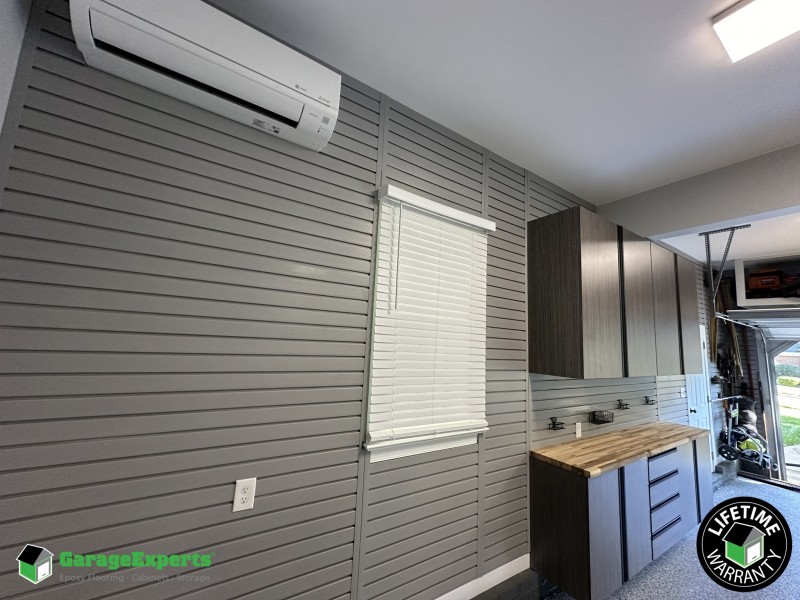 Residential Garage Epoxy Flooring and Cabinet Storage Solution in Raleigh, Nc