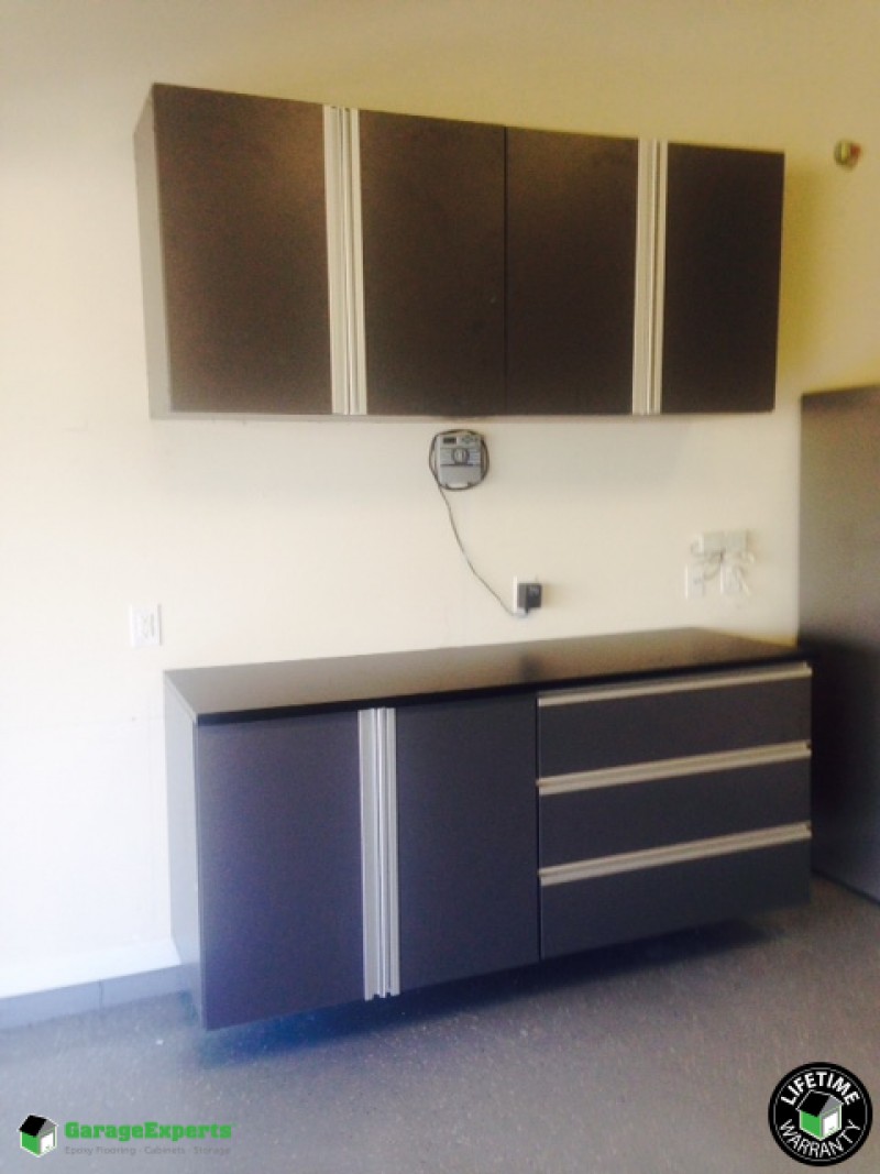 Residential Garage Epoxy Flooring and Cabinet Storage Solution in Charlotte, Nc