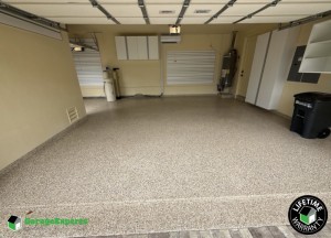 Residential Garage Makeover Epoxy Flooring and Cabinet Storage Solution in Palm Beach Gardens, Fl
