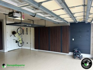 Residential Garage Epoxy Flooring and Cabinet Storage Solution in Lakeland, Fl