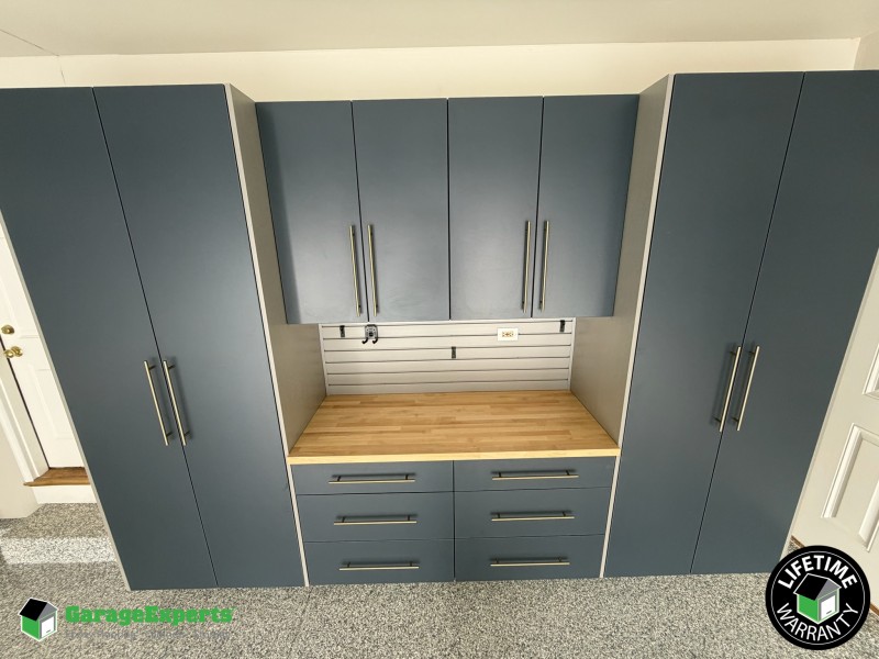 Residential Garage Epoxy Flooring and Cabinet Storage Solution in Geneva, Il Image