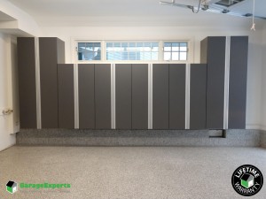 Residential Garage Epoxy Flooring and Cabinet Storage Solution in North Hampton, Nh