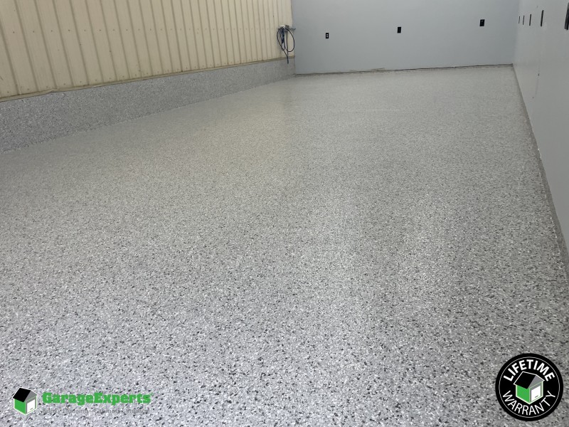 Residential Garage Epoxy Flooring and Cabinet Storage Solution in Woodstock, Virginia Image