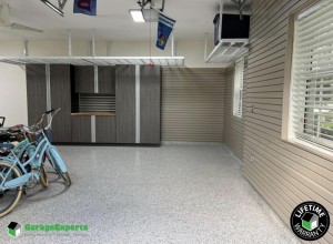 Residential Garage Epoxy Flooring and Cabinet Storage Solution in Campton Hills, Il