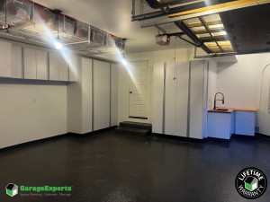 Residential Garage Epoxy Flooring and Cabinet Storage Solution in Kirkland, Washington