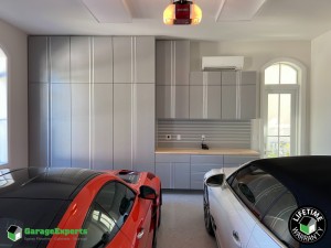 Residential Garage Epoxy Flooring and Cabinet Storage Solution in Huntsville, Al