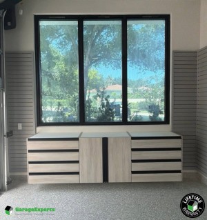 Residential Garage Epoxy Flooring and Cabinet Storage Solution in Wayne, Il
