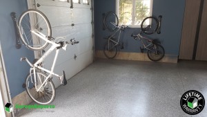 Residential Garage Epoxy Flooring and Cabinet Storage Solution in Waunakee, Wisconsin