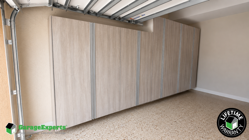 Residential Garage Epoxy Flooring and Cabinet Storage Solution in Miami, Fl