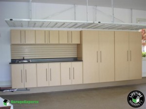Residential Garage Epoxy Flooring and Cabinet Storage Solution in Cornelius, Nc