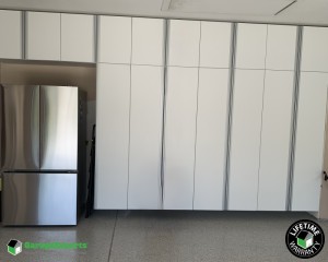 Residential Garage Epoxy Flooring and Cabinet Storage Solution in Fresno, Ca