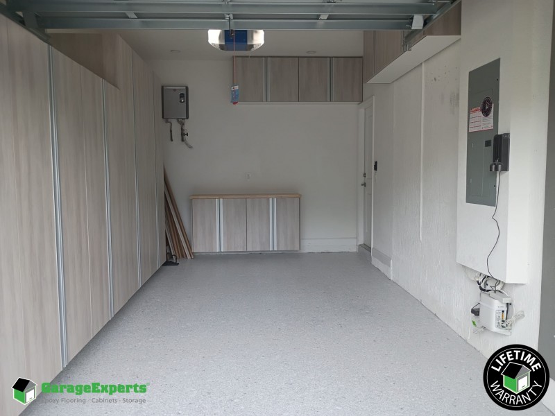 Residential Garage Epoxy Flooring and Cabinet Storage Solution in Miami, Fl Image