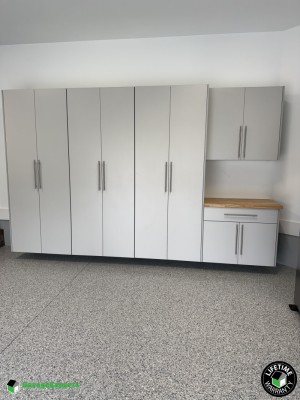 Residential Garage Epoxy Flooring and Cabinet Storage Solution in Sunset Beach, Nc