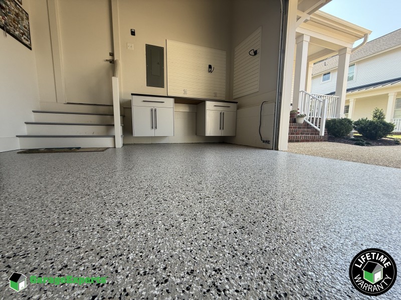 Residential Garage Epoxy Flooring and Cabinet Storage Solution in Williamsburg, Virginia