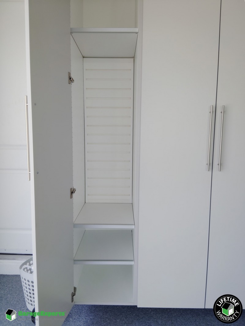 Residential Garage Epoxy Flooring and Cabinet Storage Solution in Boynton Beach, Fl