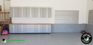 Residential Garage Epoxy Flooring and Cabinet Storage Solution in Madison, Wi