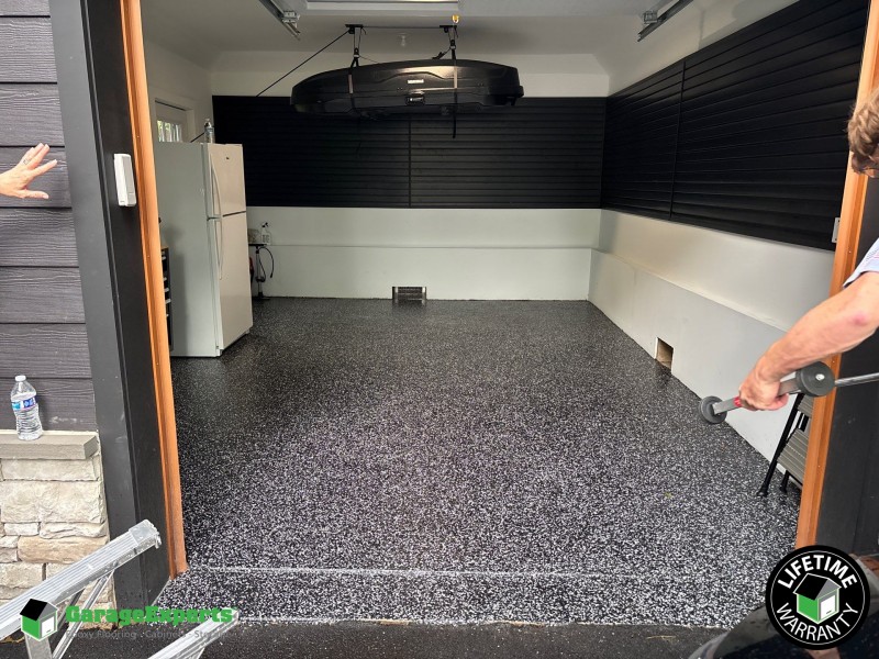 Residential Garage Epoxy Flooring and Storage Solution in Montclair, New Jersey