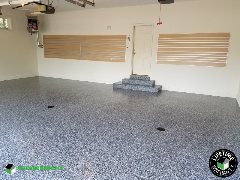 Residential Garage Epoxy Flooring and Cabinet Storage Solution in Hopkins, Mn Image