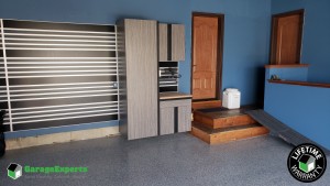 Residential Garage Epoxy Flooring and Cabinet Storage Solution in Waunakee, Wisconsin