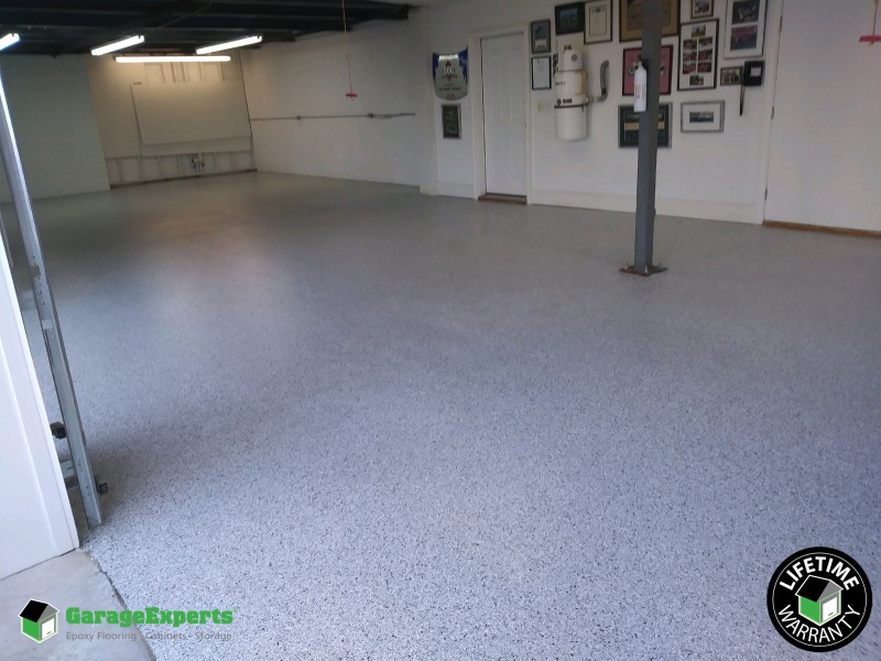 Residential Garage Epoxy Flooring and Cabinet Storage Solution in Charotte, Nc