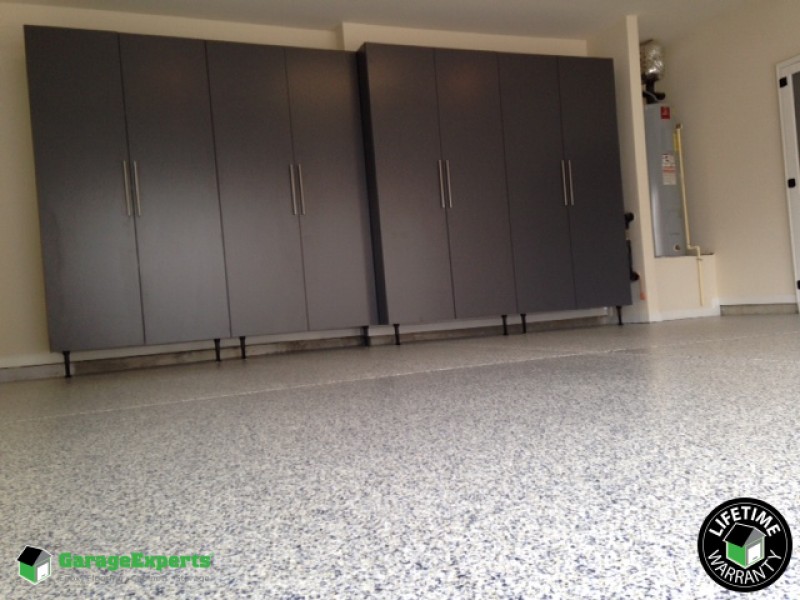 Residential Garage Epoxy Flooring and Cabinet Storage Solution in Charlotte, Nc