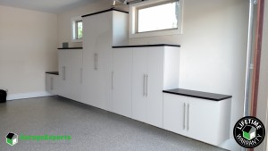 Residential Garage Epoxy Flooring and Cabinet Storage Solution in Canton, Ga