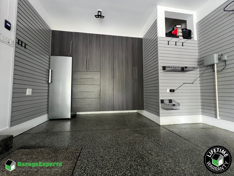 Residential Garage Epoxy Flooring and Cabinet Storage Solution in Naperville, Il Image