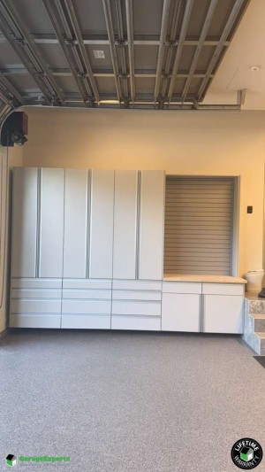 Residential Garage Epoxy Flooring and Cabinet Storage Solution in Miami Beach, Fl